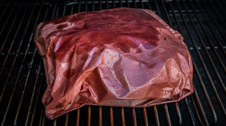 bagged pork on the smoker