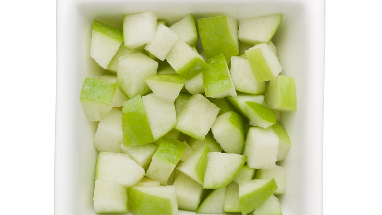 diced apple in cup