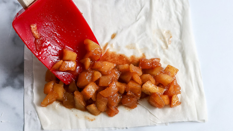 apple pie filling spooned onto phyllo dough