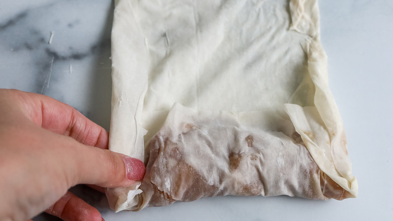 Edges of phyllo being folded