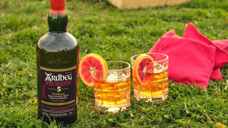 Ardbeg 5-year bottle on lawn