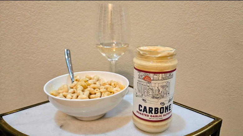 Carbone garlic alfredo, pasta, and wine