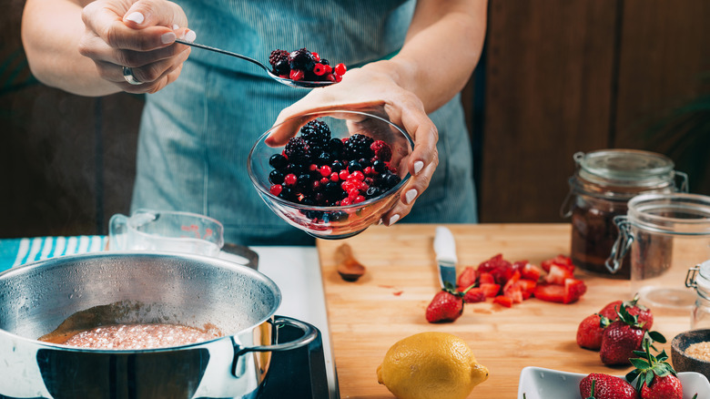 woman making jam