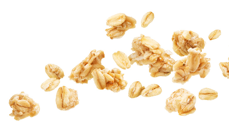 clusters of muesli on white background