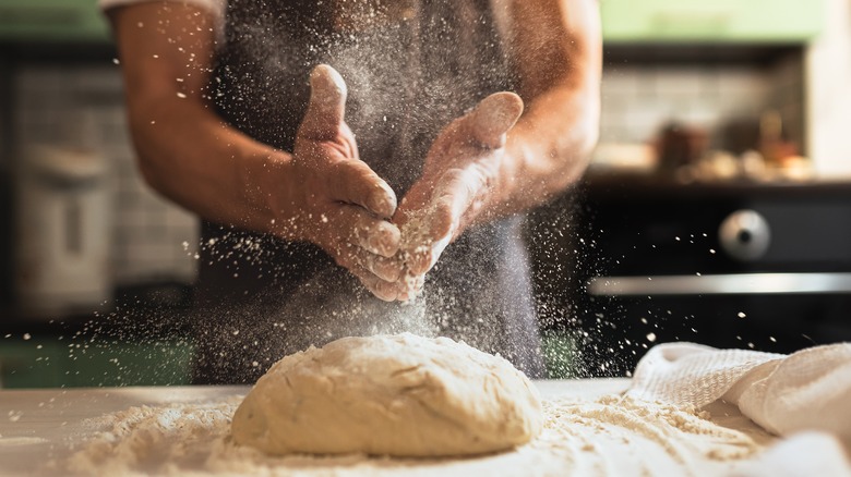 floured hands slapping together