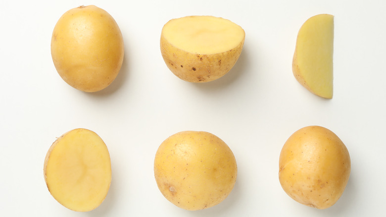 Whole and cut raw potatoes