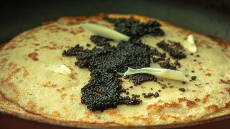 Black caviar on a pancake