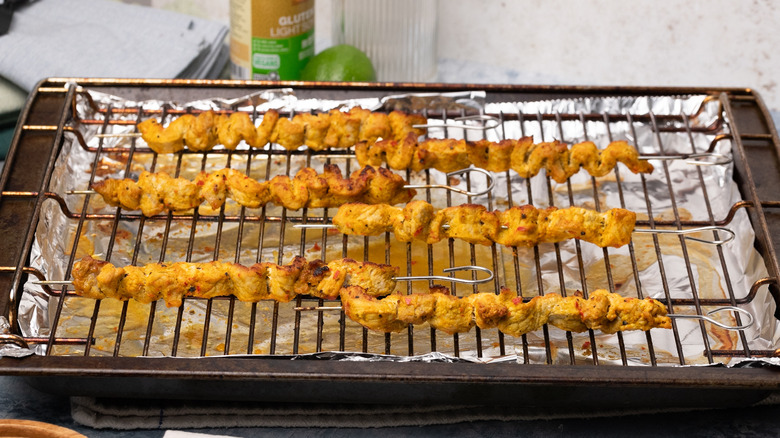 broiling pork satay skewers