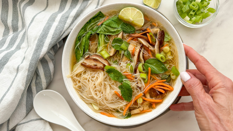 bowl of vegetarian pho with toppings