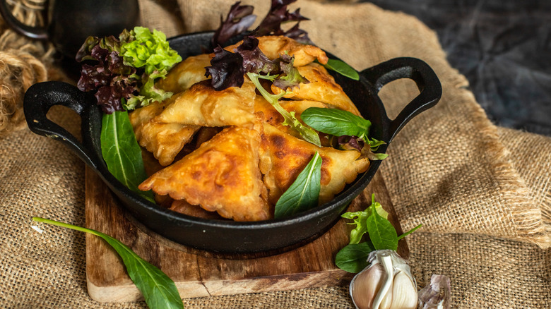 Samosas in a skillet