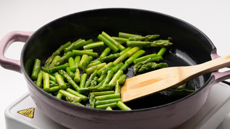 chopped asparagus in pan