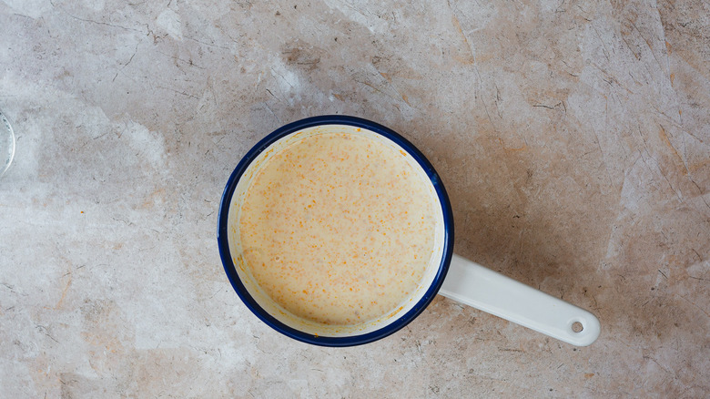 Saucepan with orange creamer