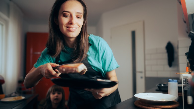 woman preparing tuna steak