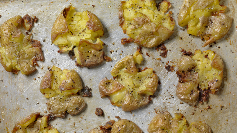 smashed potatoes on a tray