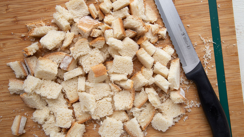 chunks of bread with knife