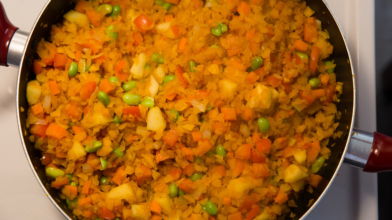 colorful cooked vegetables in pan 