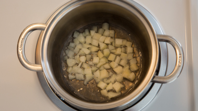 diced pear boiling in pot 