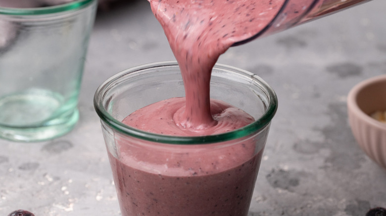 smoothie pouring into glass