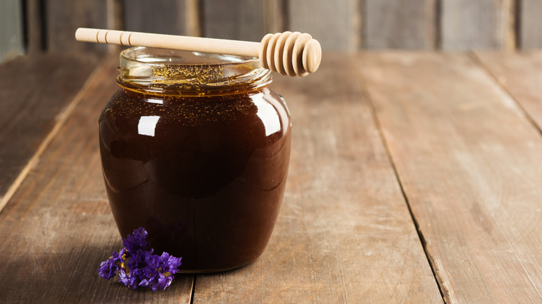 dark honey in jar