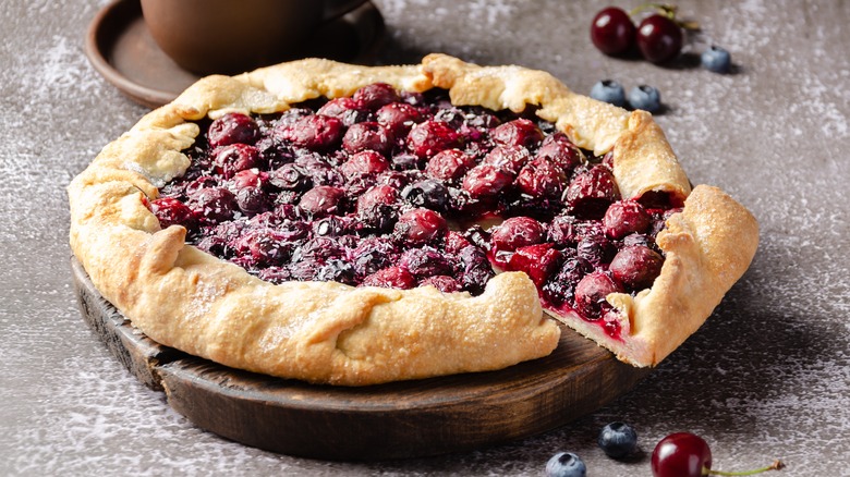 berry galette on wooden tray