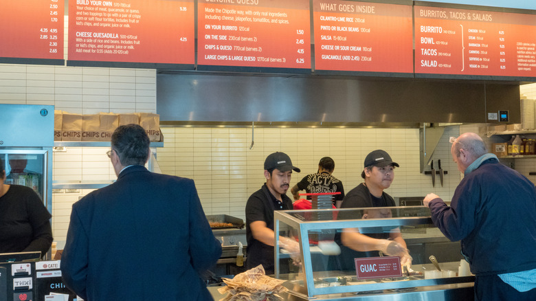 People ordering at Chipotle.