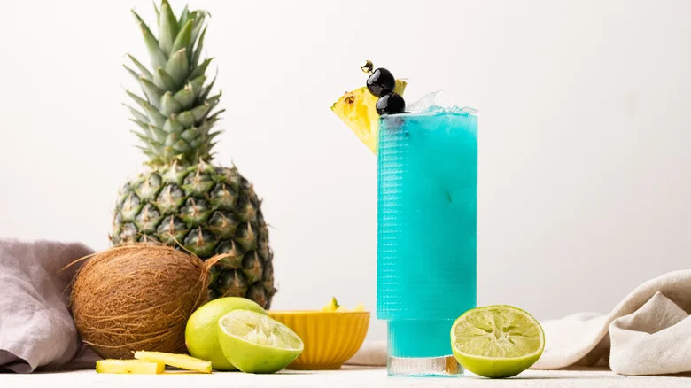 A Blue Hawaiian cocktail with pineapple and lime