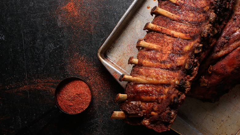 ribs with dish of seasoning