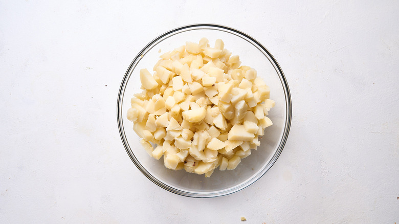 peeled and chopped potatoes in bowl
