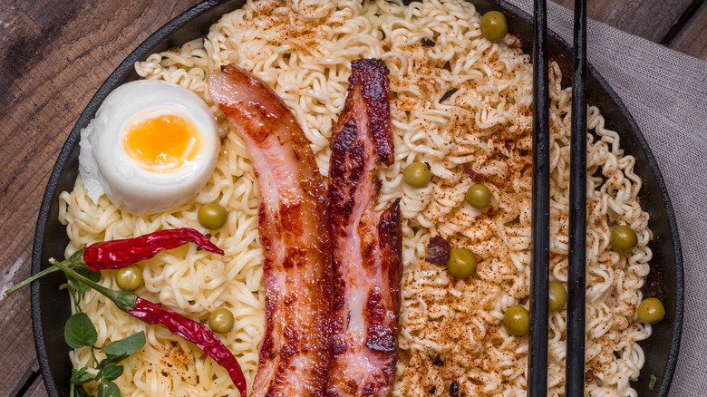 ramen with bacon strips and an egg