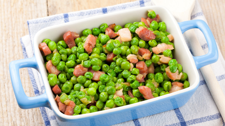 Peas and ham in a casserole dish