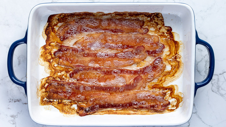 cooked bacon in casserole dish