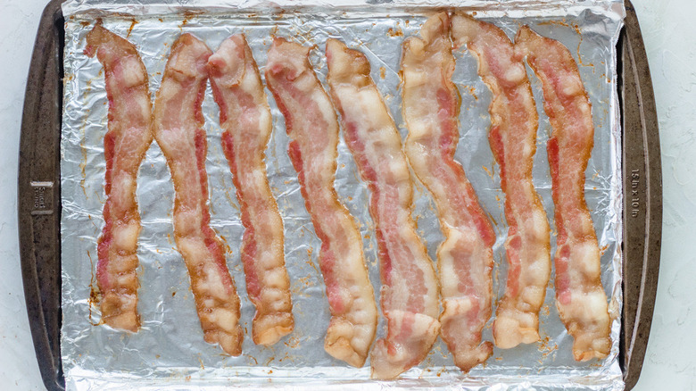 bacon on foil-lined baking sheet