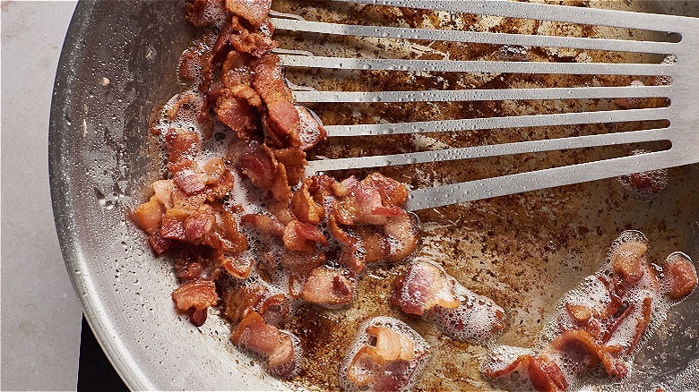 cooking bacon in skillet