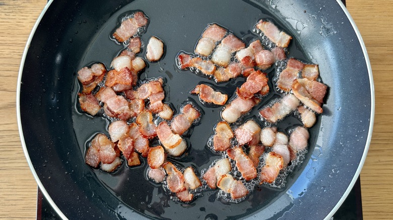 Cooking bacon in pan