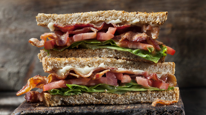 Two halves of BLT stacked 