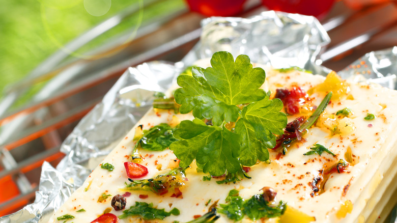 Feta in foil with herbs and chili