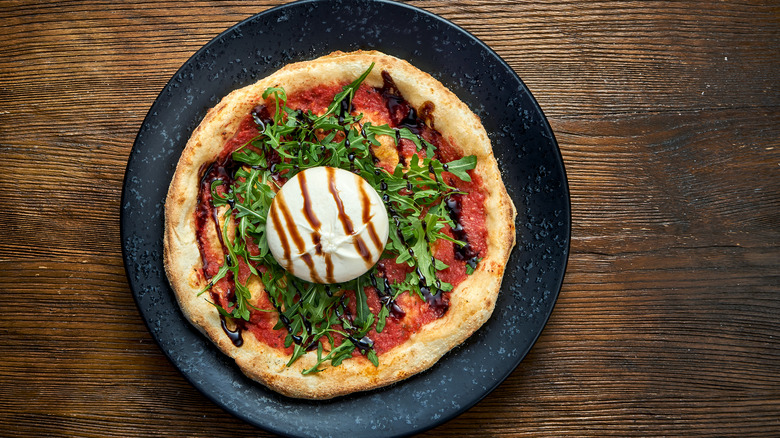 burrata pizza topped with balsamic