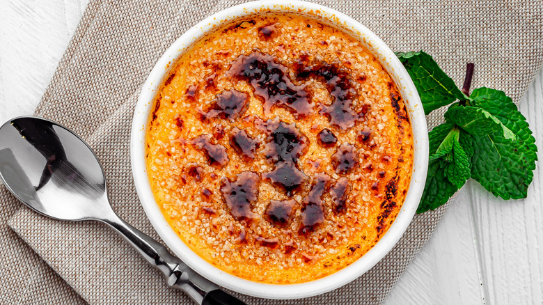 Overhead image of crème brûlée with a spoon