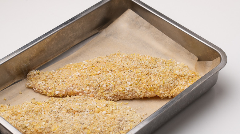 tilapia on baking sheet