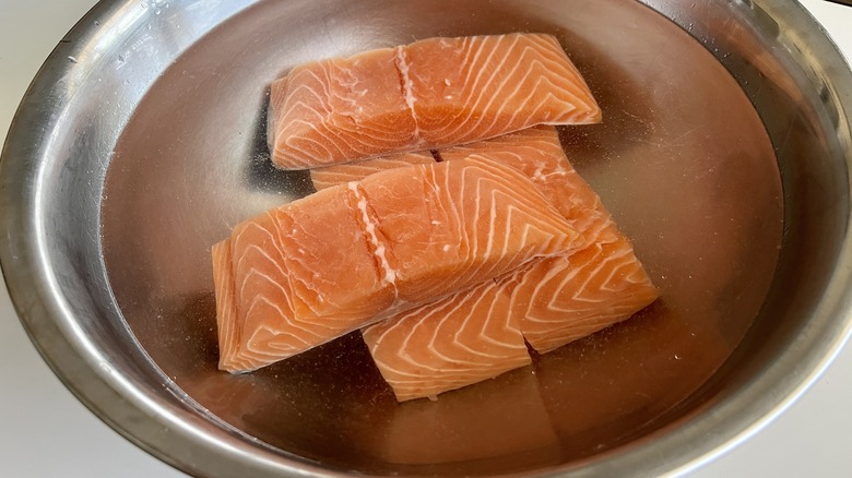 salmon fillets in salt brine