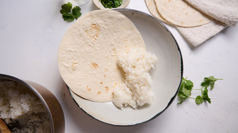 tortilla and rice in a bowl