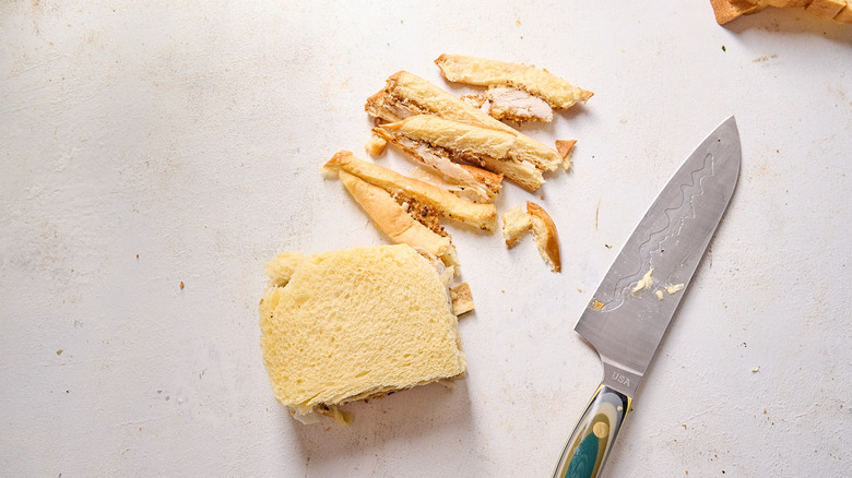 crusts sliced off of chicken katsu sandwich