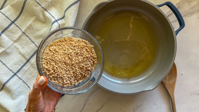 breadcrumbs over pan