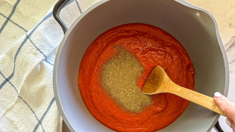 sauce with seasonings in pot