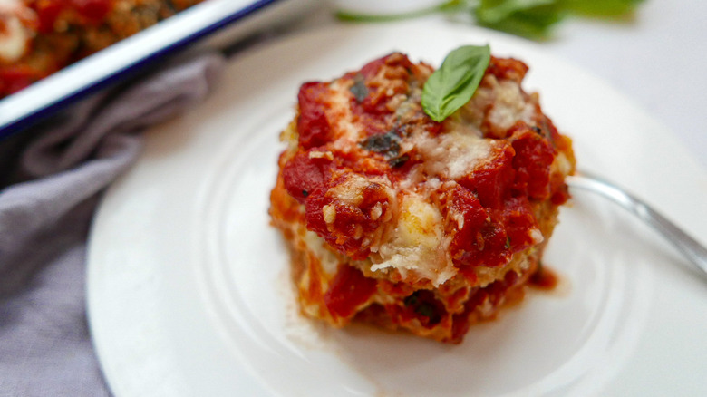 baked eggplant parmesan on plate 