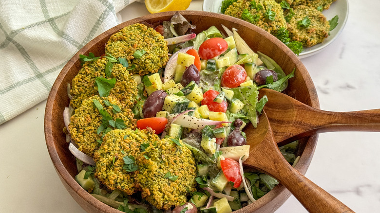 falafel salad in wood bowl