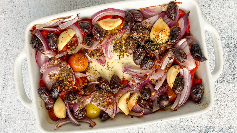 feta and vegetables in baking dish