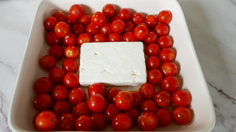 feta and tomatoes in baking dish 