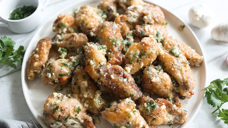 baked garlic parmesan wings on plate 