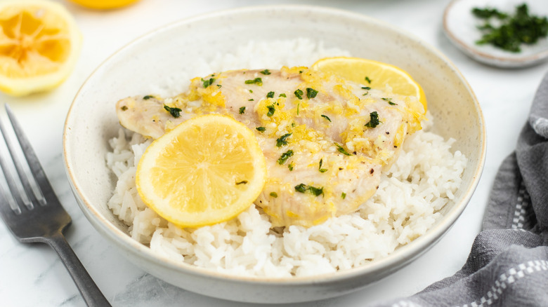 baked garlic tilapia in bowl 